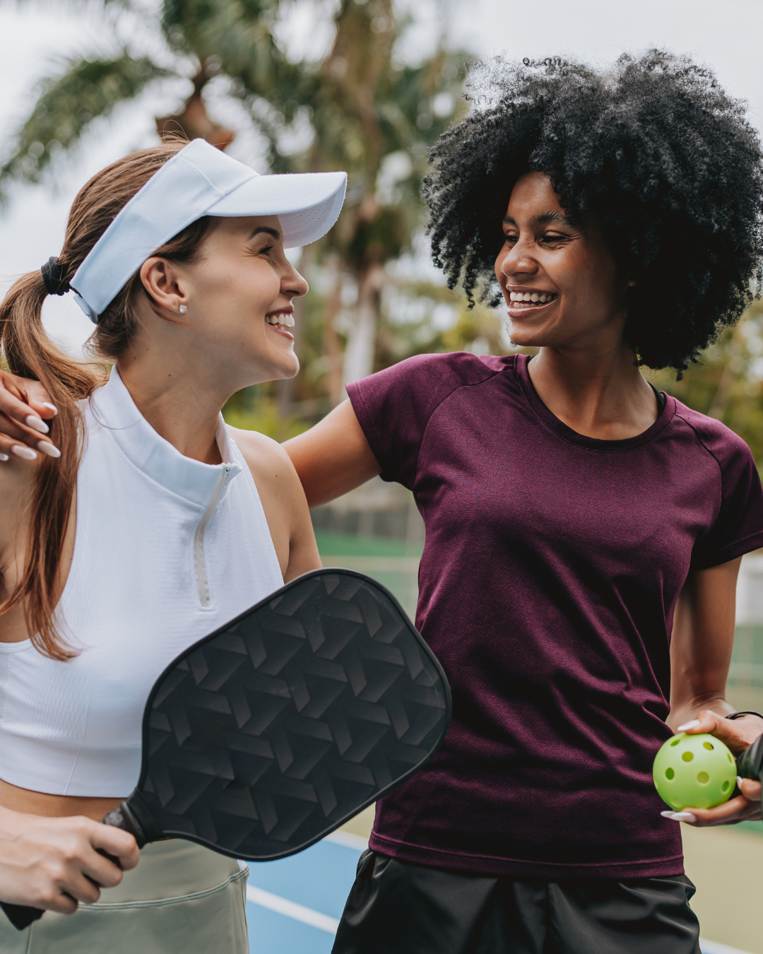 Two pickleball players on the court together
